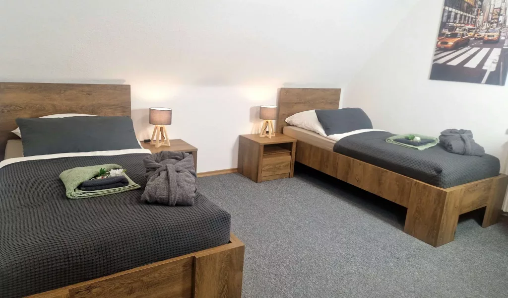 Einzelbetten Schlafzimmer 2 Ferienwohnung Landlicht